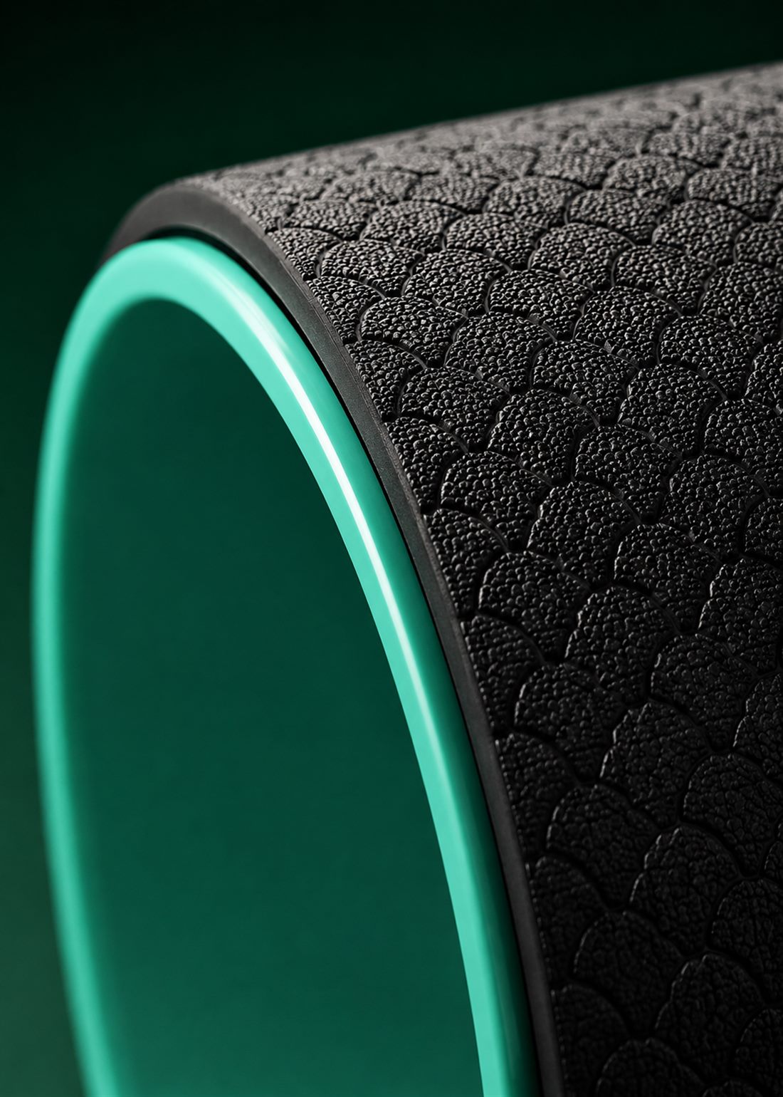 Close-up of the textured grip and mint-green rim of the YJ Recovery Wheel